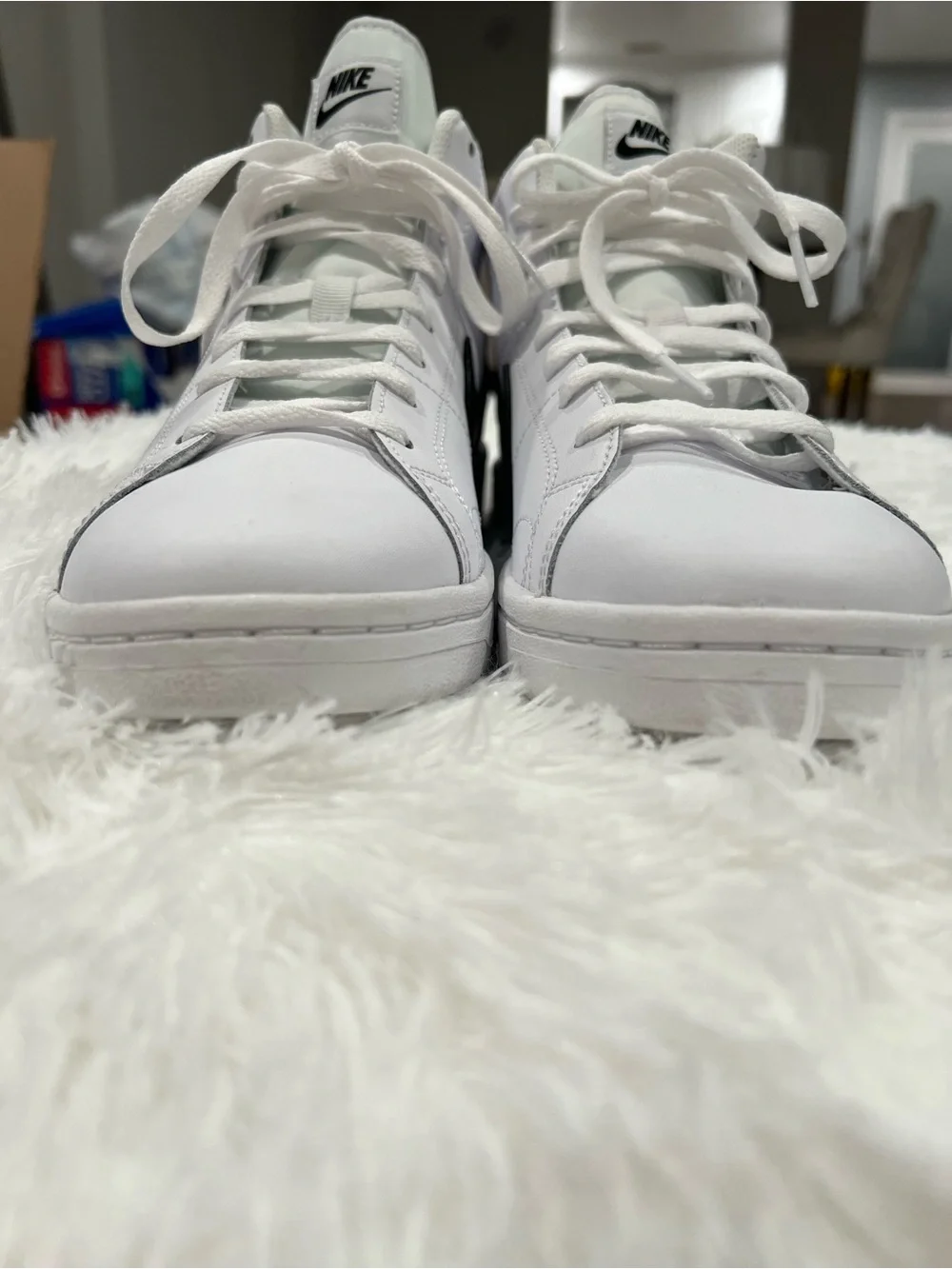 Nike White High-Top Sneakers with Black Swoosh and Tan Heel Tab